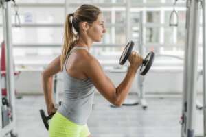Young woman training in the gym